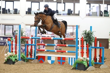 Kerry Brennan lands the Winter Grand Prix at Bury Farm Equestrian Centre 